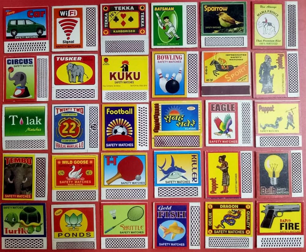 Grid of colorful vintage matchbox labels arranged in rows and columns, showcasing diverse logos and artwork.