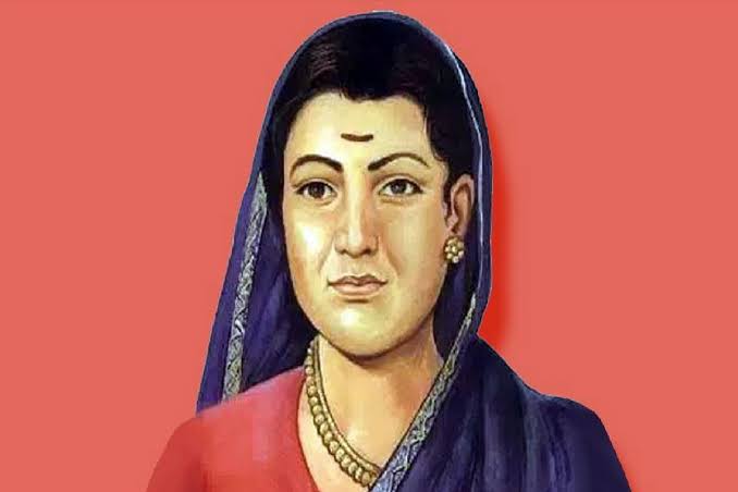 Portrait painting of a woman wearing a blue sari and gold jewelry against a coral background, looking straight ahead.